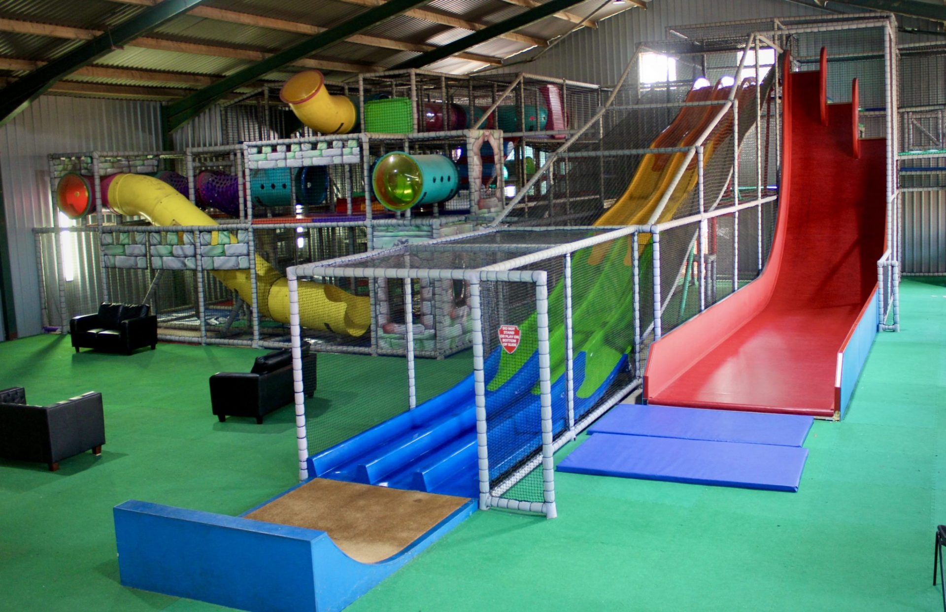 indoor soft play with big slides and maze at 4 Kingdoms